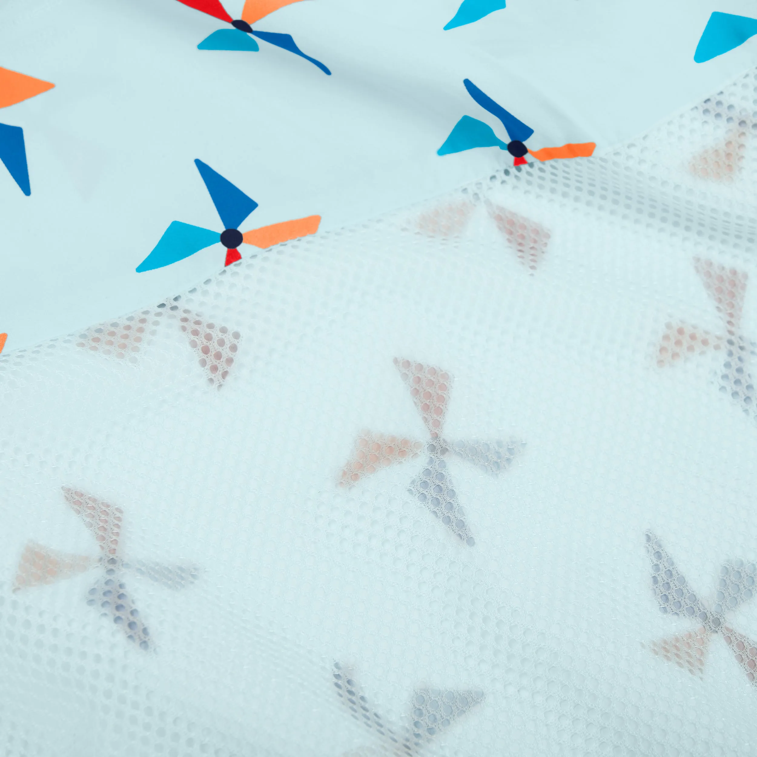 Kids packable windbreaker in pinwheels